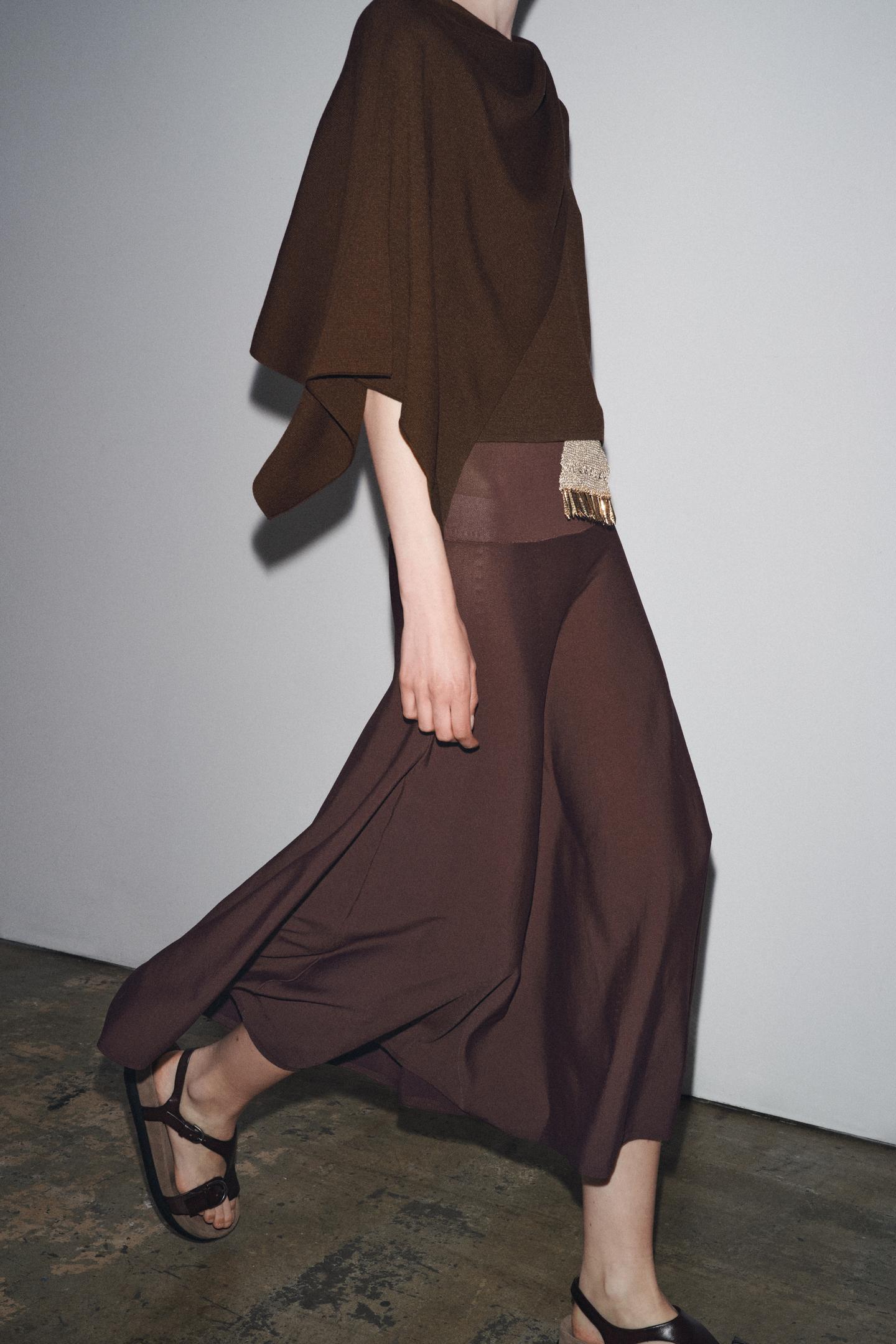 Knitted Sweater With Cape Sleeves