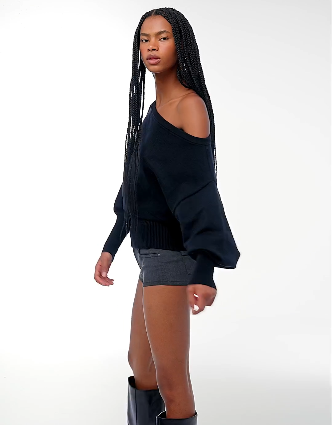 Asymmetric sweater with ribbed hem